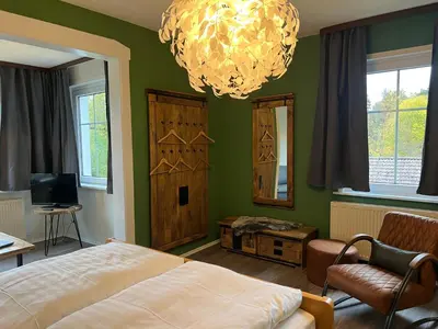 Ein Bett oder Betten in einem Zimmer der Unterkunft Villa Gesine
