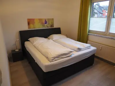 Ein Bett oder Betten in einem Zimmer der Unterkunft Ferienwohnung Bodeblick Braunlage