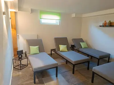 Ein Sitzbereich in der Unterkunft Ferienhaus Harzer Bergwelten mit Sauna, Grill und Garten
