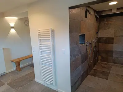 Ein Badezimmer in der Unterkunft Ferienhaus Harzer Bergwelten mit Sauna, Grill und Garten