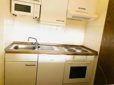 Küche/Küchenzeile in der Unterkunft Superior Apartment 581, mit Sauna & Schwimmbad