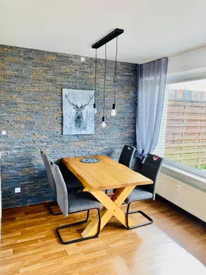 Ein Sitzbereich in der Unterkunft Terrassenhaus im Harz, Pool, Sauna, WLAN