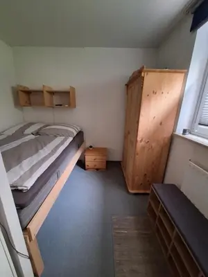 Ein Bett oder Betten in einem Zimmer der Unterkunft Apartment am Rodelberg