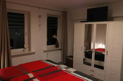 Ein Bett oder Betten in einem Zimmer der Unterkunft Ferienwohnung Eisblick