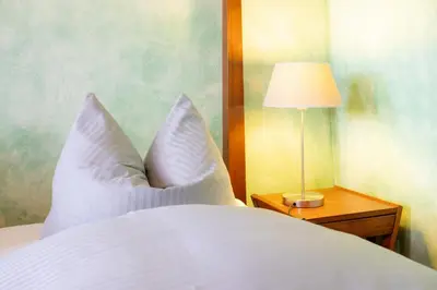 Ein Bett oder Betten in einem Zimmer der Unterkunft Ferienhaus am Glockenberg