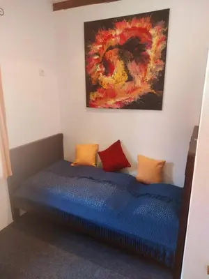 Ein Bett oder Betten in einem Zimmer der Unterkunft TheBackyard