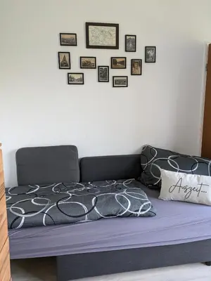 Ein Bett oder Betten in einem Zimmer der Unterkunft FeWo Waldseeblick Hahnenklee