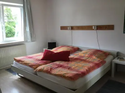 Ein Bett oder Betten in einem Zimmer der Unterkunft Appartements Am Hexenstieg