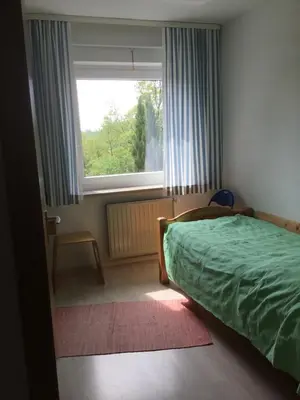 Ein Bett oder Betten in einem Zimmer der Unterkunft Appartements Am Hexenstieg