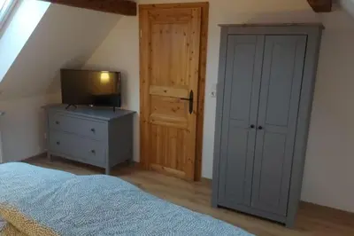 Ein Bett oder Betten in einem Zimmer der Unterkunft Ferienwohnung Gisela 80qm