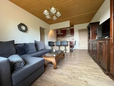 Ein Sitzbereich in der Unterkunft Ferienwohnung Hexenstieg