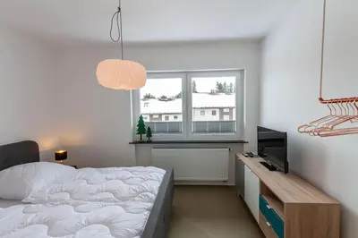 Ein Bett oder Betten in einem Zimmer der Unterkunft Ferienwohnung Natur Loft im Haus Tannenblick Lofts