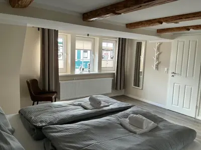 Ein Bett oder Betten in einem Zimmer der Unterkunft Haus Bergstadtblick Fewo Auszeit