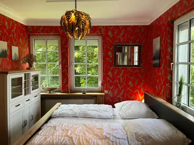 Ein Bett oder Betten in einem Zimmer der Unterkunft Ferienwohnung Berghexe mit Terrasse