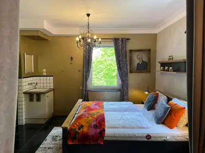 Ein Bett oder Betten in einem Zimmer der Unterkunft Ferienwohnung Berghexe mit Terrasse