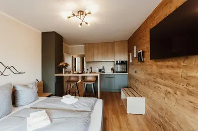 Ein Bett oder Betten in einem Zimmer der Unterkunft Harzchalet Emma 3 - mit Sauna - Sankt Andreasberg