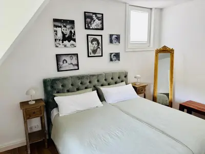 Ein Bett oder Betten in einem Zimmer der Unterkunft Ferienwohnung La Dolce Vita