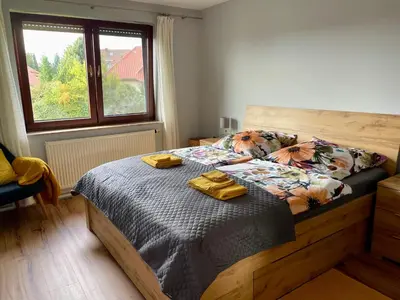Ein Bett oder Betten in einem Zimmer der Unterkunft Ferienwohnung Laura