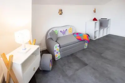 Ein Bett oder Betten in einem Zimmer der Unterkunft Ferienhaus Brockenoase Apartment Bergzauber