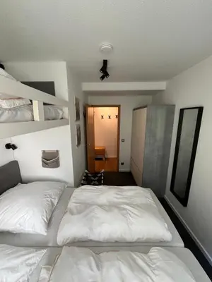 Ein Bett oder Betten in einem Zimmer der Unterkunft Ferienwohnung Harzzz