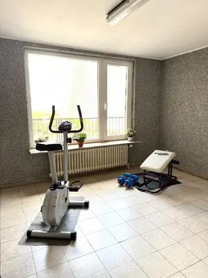 Das Fitnesscenter und/oder die Fitnesseinrichtungen in der Unterkunft Erstklassige Ferienwohnung zentral - Gipfelblick, Parkplatz & Bettwäsche inklusive