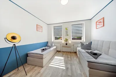 Ein Sitzbereich in der Unterkunft Wohnung Stadtrand, 4 Personen, nahe Bahnhof und See