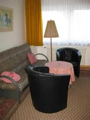 Ein Sitzbereich in der Unterkunft Ferienwohnung Brüggemann