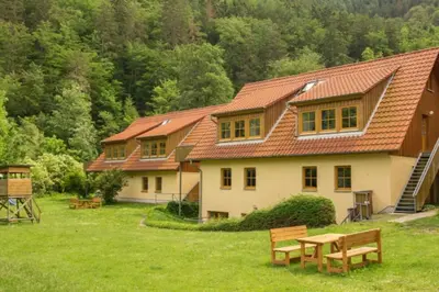 Ein Garten an der Unterkunft Ferienwohnung Ferienhäuser am Brocken, 80 qm 3 Schlafzimmer