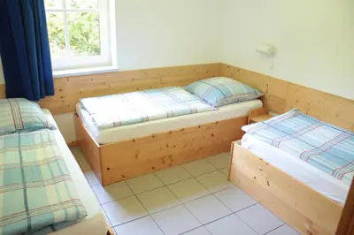 Ein Bett oder Betten in einem Zimmer der Unterkunft Ferienwohnung Ferienhäuser am Brocken, 60 qm 2 Schlafzimmer