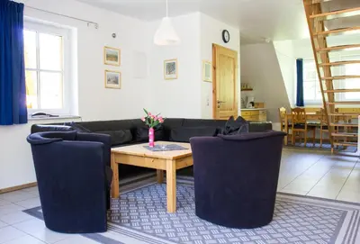 Ein Sitzbereich in der Unterkunft Ferienwohnung Ferienhäuser am Brocken, 80 qm 3 Schlafzimmer