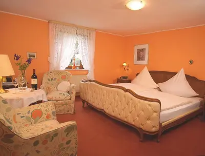 Ein Sitzbereich in der Unterkunft Landhaus Meyer