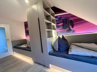 Ein Bett oder Betten in einem Zimmer der Unterkunft HarzFokus - Brightnest - #Netflix#Wlan#Zentrum