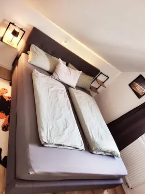 Ein Bett oder Betten in einem Zimmer der Unterkunft FeWo Walsch