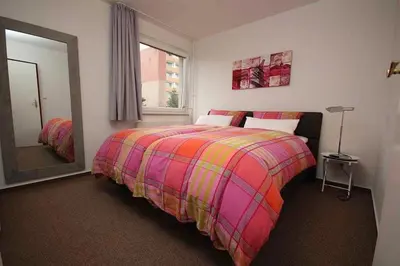 Ein Bett oder Betten in einem Zimmer der Unterkunft Ferienwohnung 