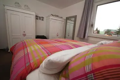 Ein Bett oder Betten in einem Zimmer der Unterkunft Ferienwohnung 