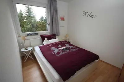 Ein Bett oder Betten in einem Zimmer der Unterkunft Ferienwohnung 
