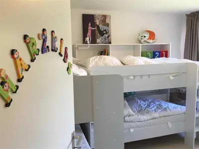 Ein Bett oder Betten in einem Zimmer der Unterkunft Ferienwohnung 