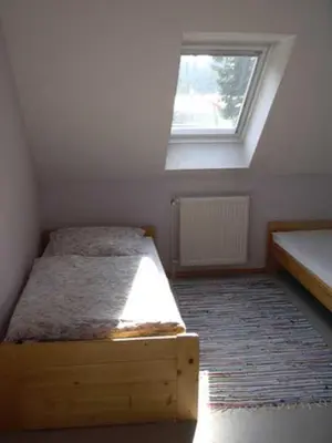 Ein Bett oder Betten in einem Zimmer der Unterkunft Ferienwohnung 