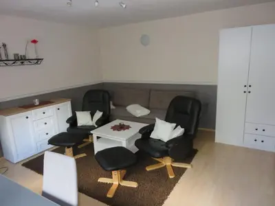 Ein Sitzbereich in der Unterkunft Ferienwohnung Lenk