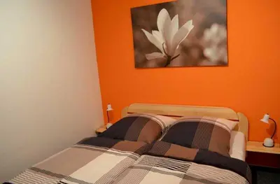 Ein Bett oder Betten in einem Zimmer der Unterkunft Ferienwohnung 