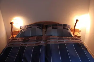 Ein Bett oder Betten in einem Zimmer der Unterkunft Ferienhaus Arnold