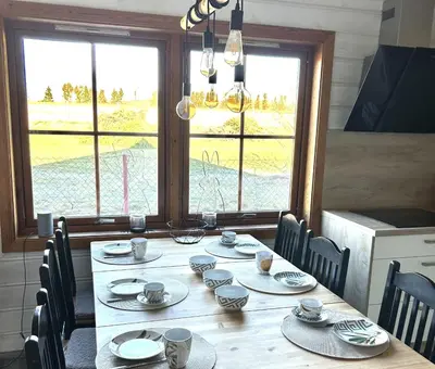 Ein Restaurant oder anderes Speiselokal in der Unterkunft Ferienhaus HarzHase
