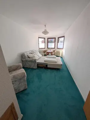 Ein Sitzbereich in der Unterkunft Ferienhaus Bornholzweg in Quedlinburg 157 qm
