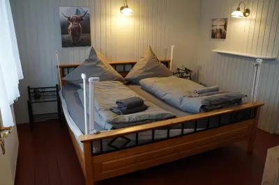 Ein Bett oder Betten in einem Zimmer der Unterkunft Das Gipp8cht Ferienhaus