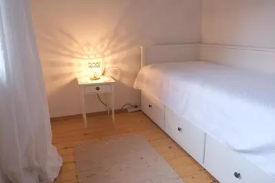 Ein Bett oder Betten in einem Zimmer der Unterkunft Haus Cona