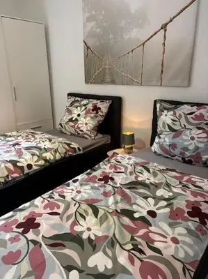 Ein Bett oder Betten in einem Zimmer der Unterkunft FeWo Am Kanonenberg 3