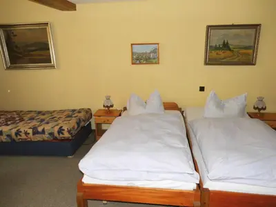 Ein Bett oder Betten in einem Zimmer der Unterkunft Ferienwohnungen im Harz