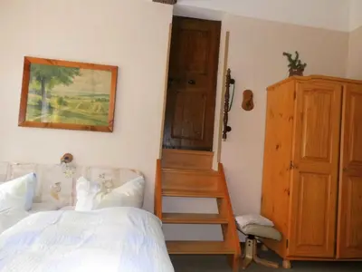 Ein Bett oder Betten in einem Zimmer der Unterkunft Ferienwohnungen im Harz