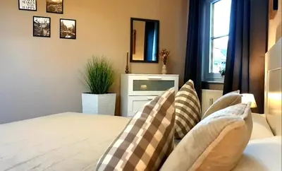 Ein Bett oder Betten in einem Zimmer der Unterkunft Ferienwohnung 