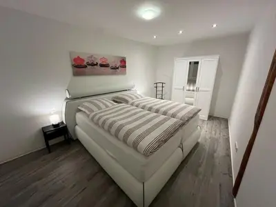 Ein Bett oder Betten in einem Zimmer der Unterkunft Am Jacobsgarten Comfortable holiday residence